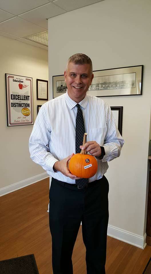 mr. dubbs with a pumpkin for giveaway